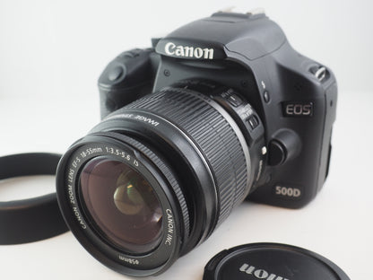 US. CANON 500D KIT 18-55 MAT. 156054602