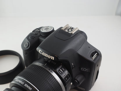 US. CANON 500D KIT 18-55 MAT. 156054602